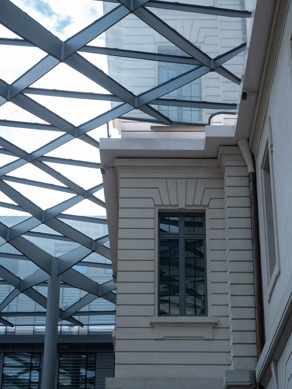 a white building with a glass roof