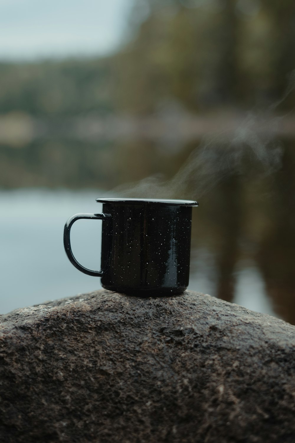 a mug on a rock