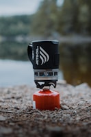 a small black and red object