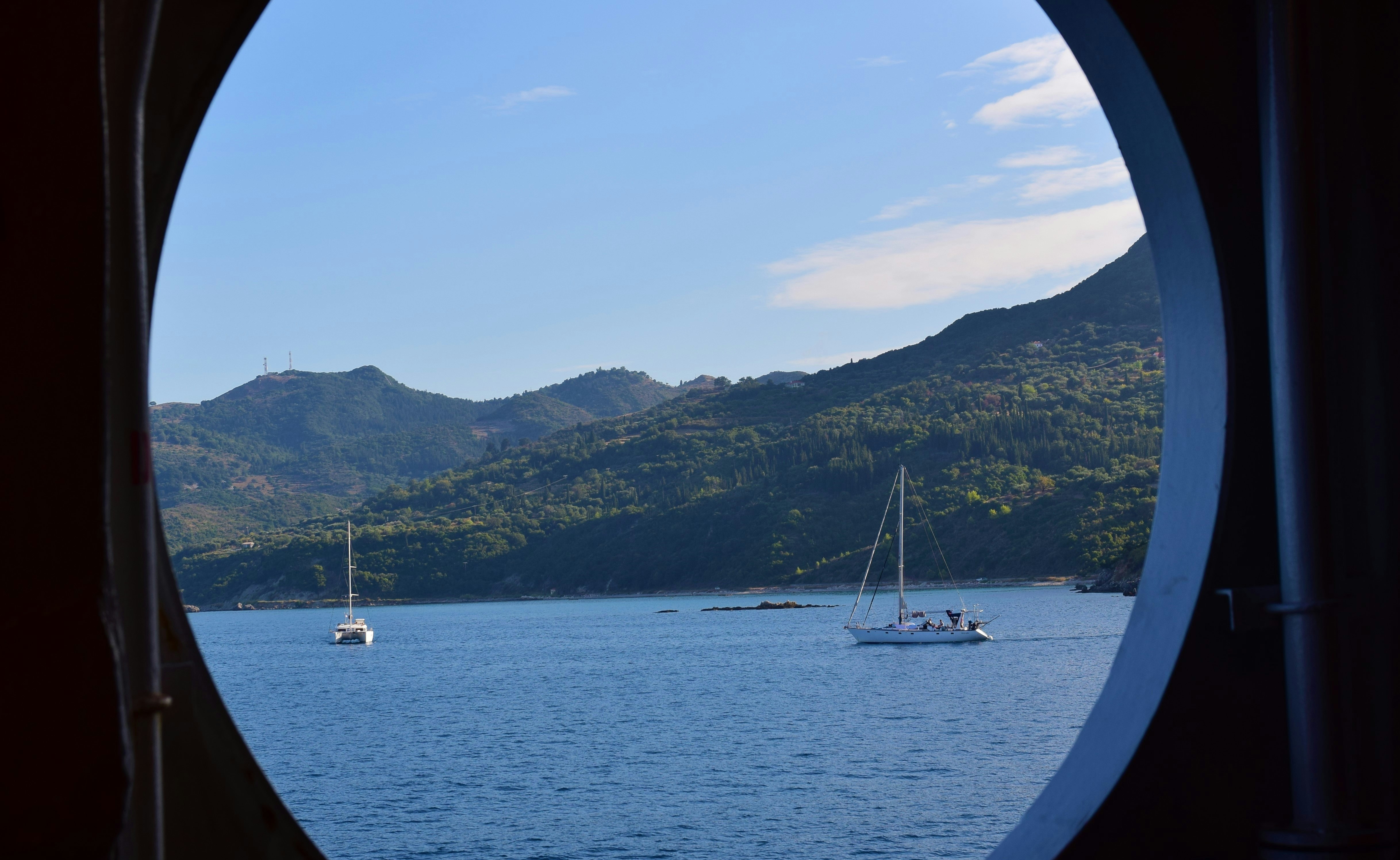a view of a lake with boats