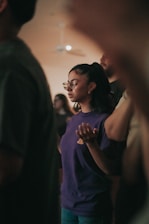 a person in a purple shirt