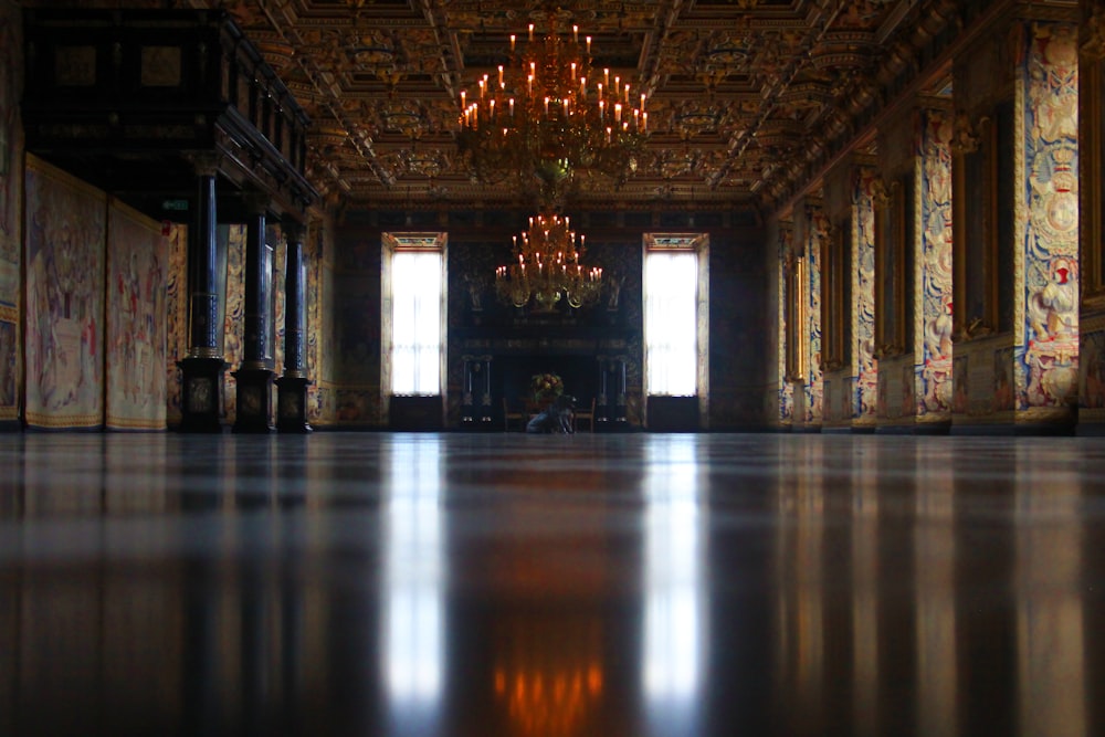 a large room with a large chandelier and a large floor