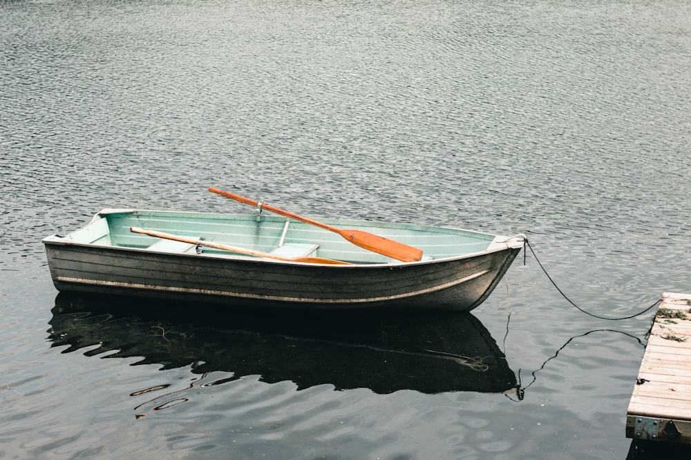 a boat tied to a dock