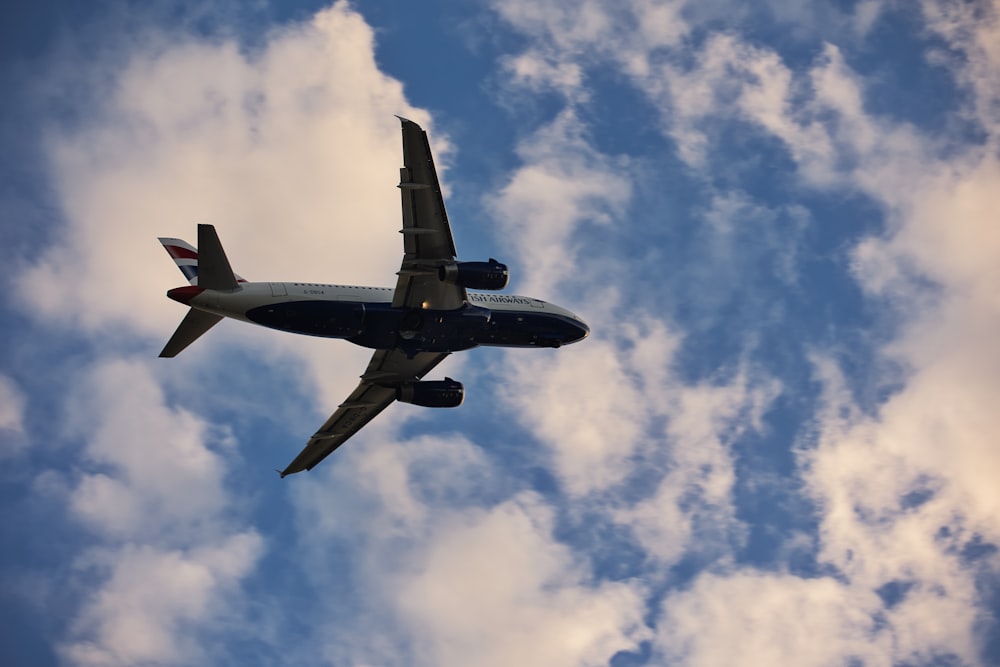 a large airplane flying in the sky