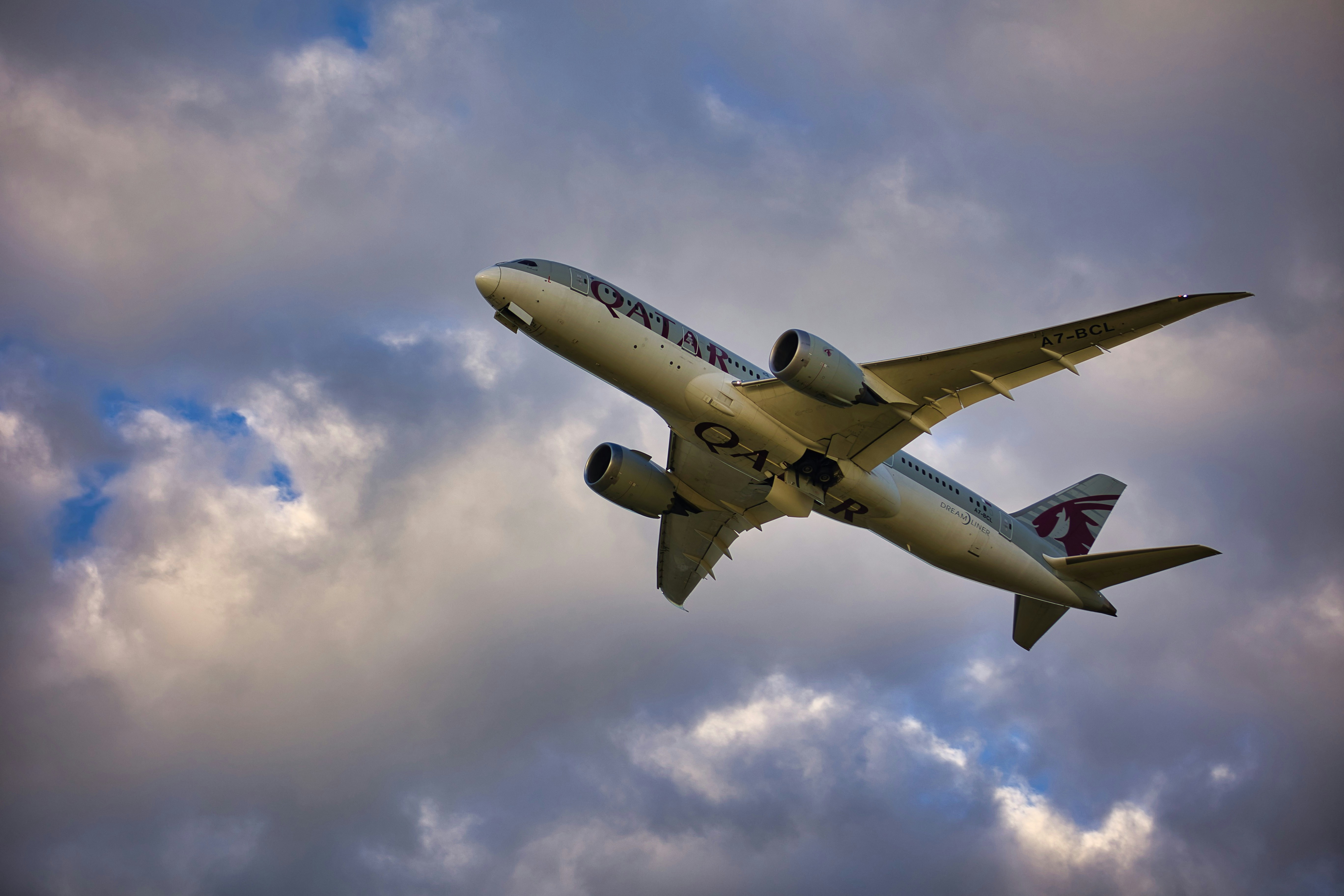 a large airplane flying in the sky, 