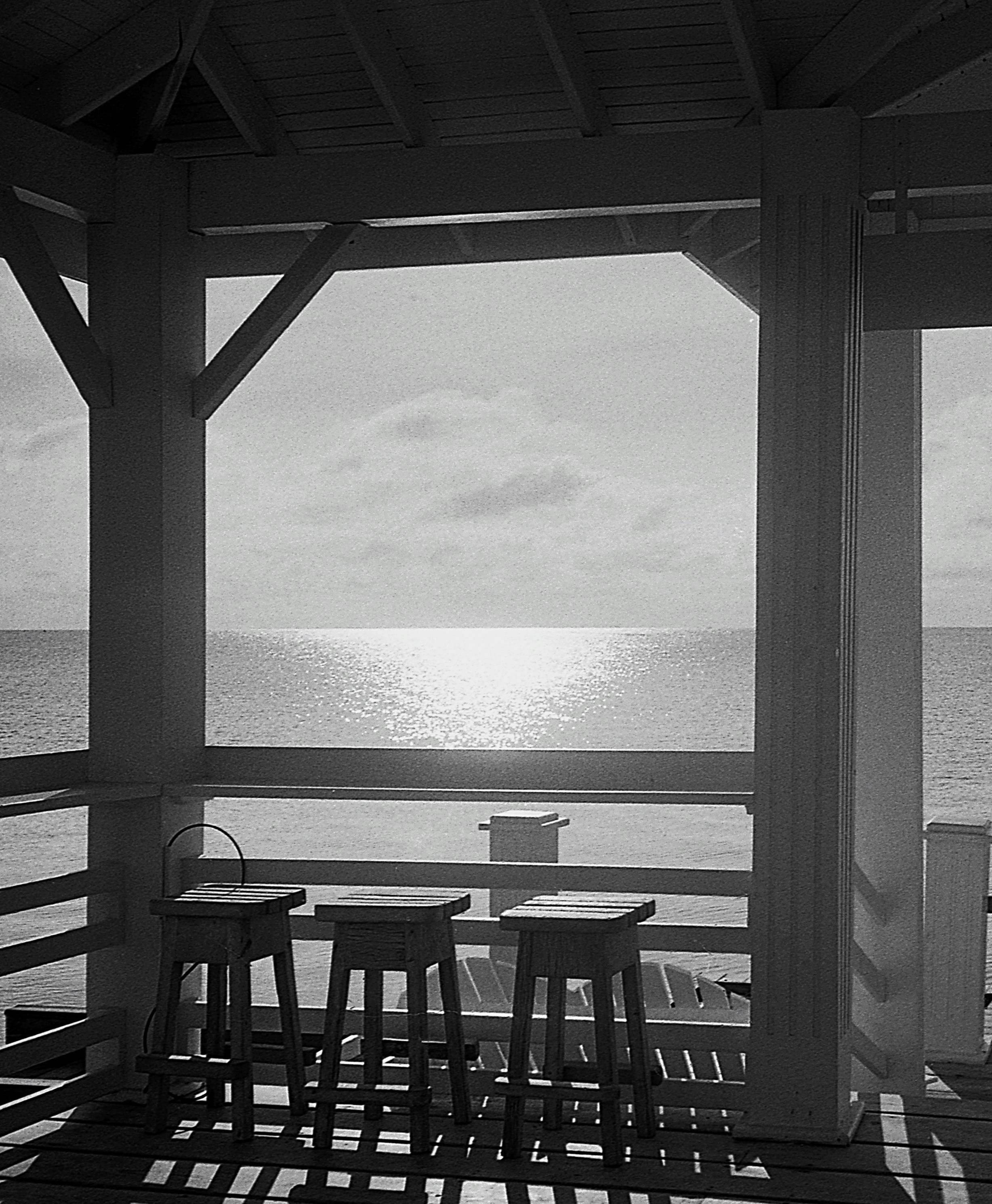 a table and chairs on a deck