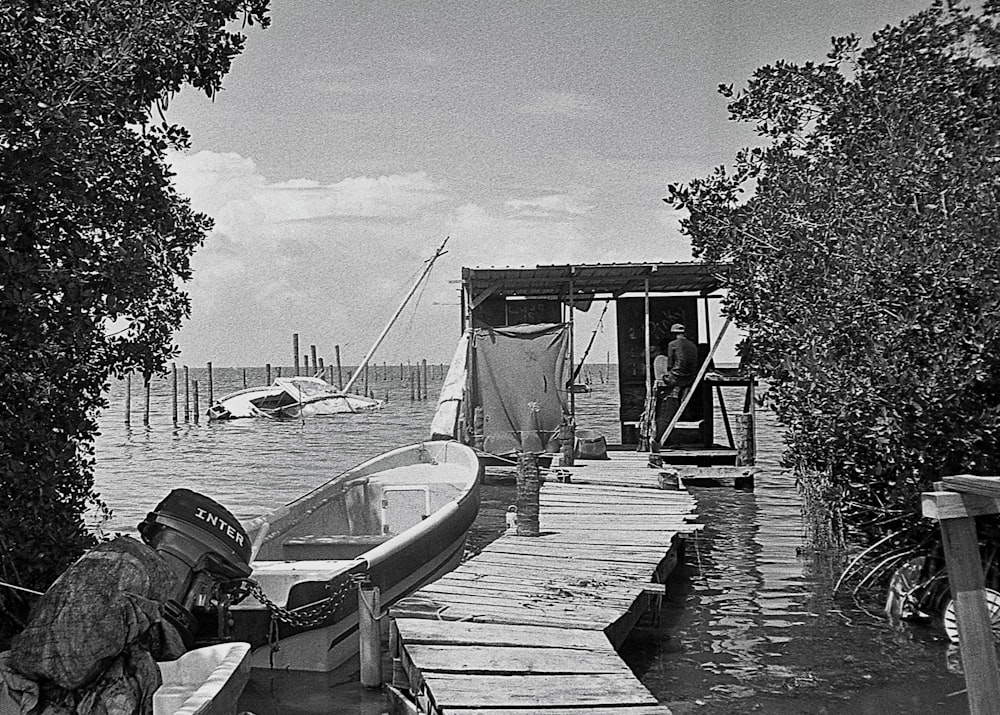 a boat is parked on the side of a dock