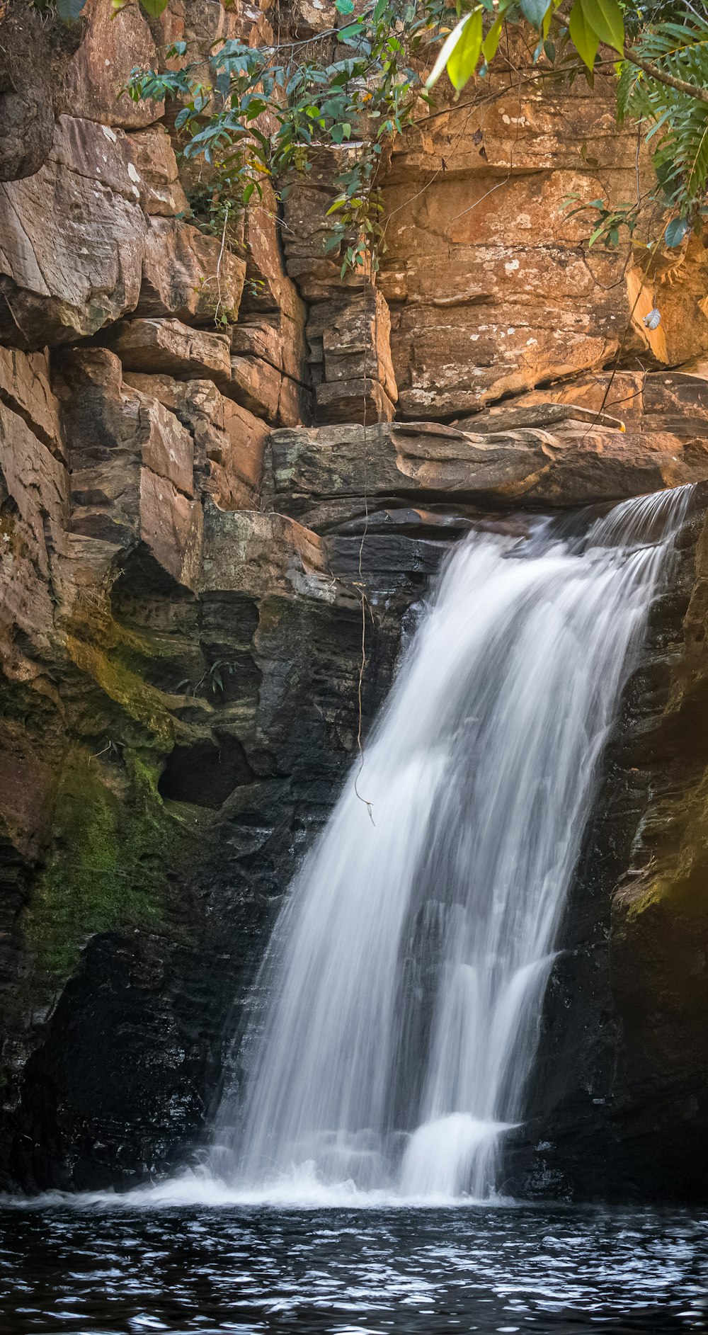 a waterfall in a rocky area