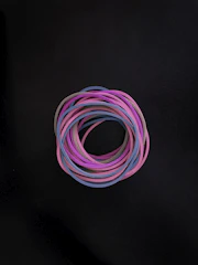 Stacks of elastic bands ready for shipment in a warehouse.