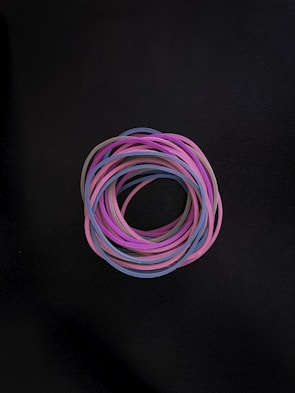 Stacked rubber bars showing thickness and flexibility