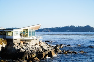 a house on a rocky shore