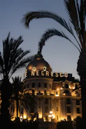 Luxury hotel facade on the Côte d'Azur, symbolizing professional responsibility.