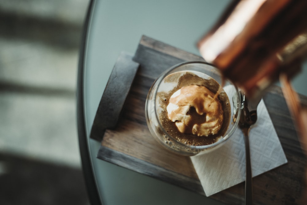 a cup of coffee with a spoon