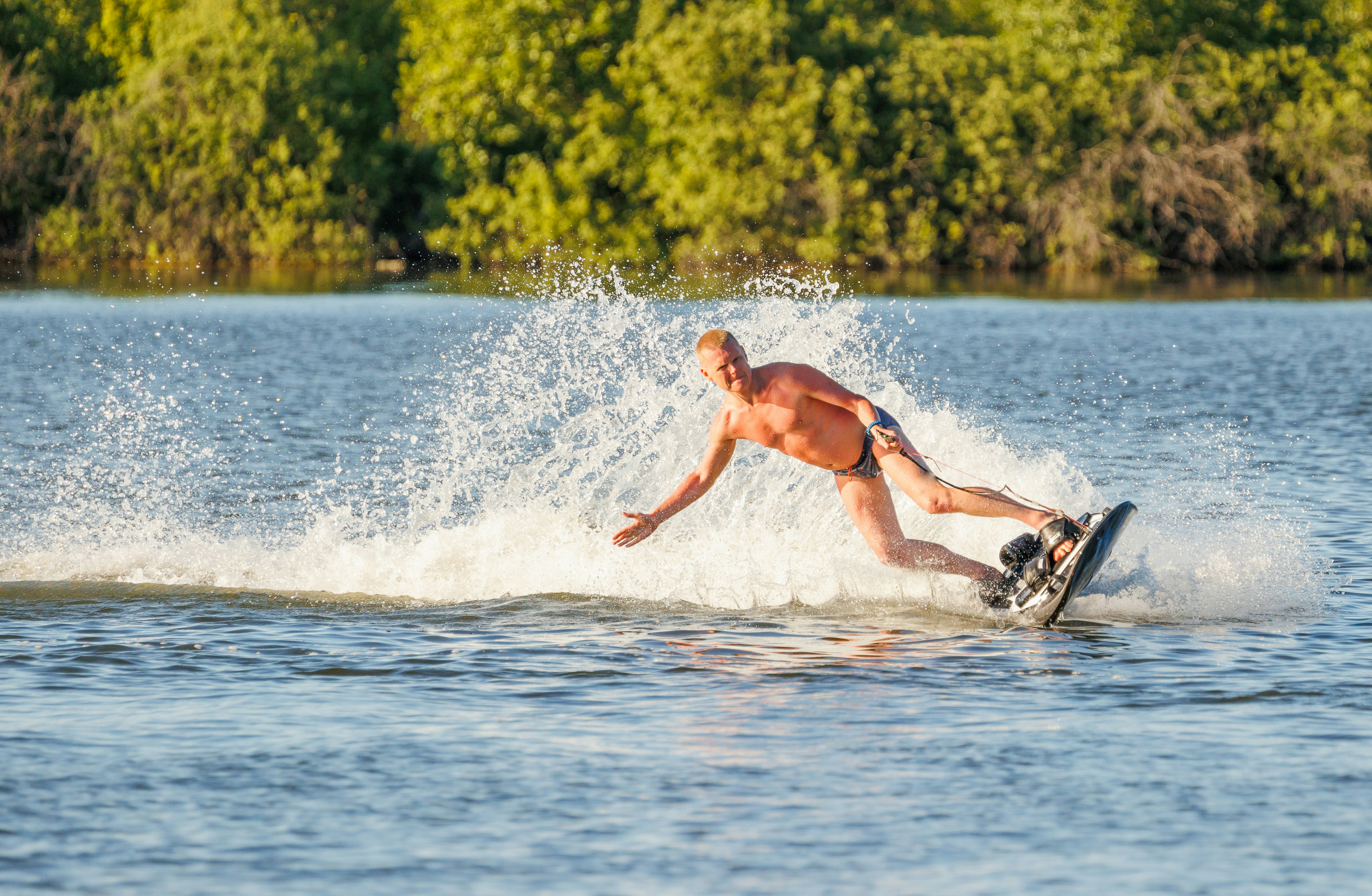 a man surfing on the waves