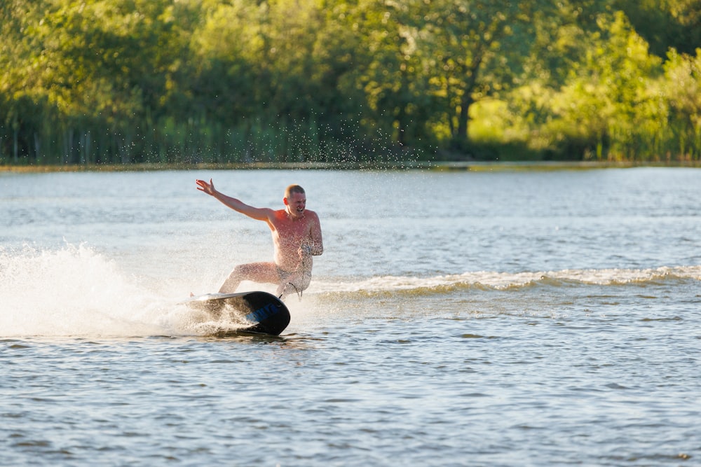 a man riding a jet ski