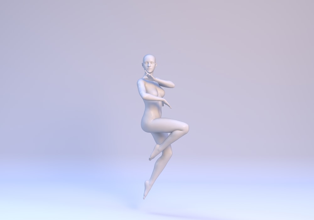 a white figurine of a person