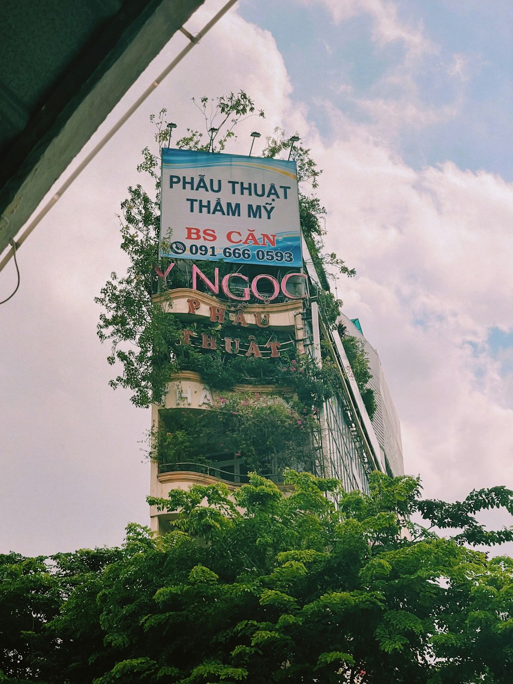 a tall tower with a sign on it