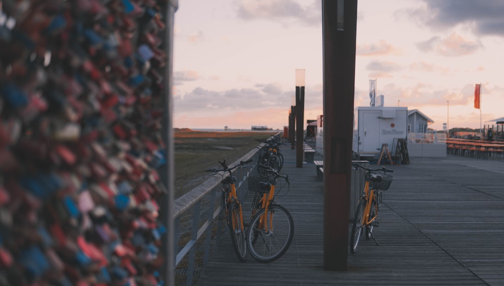 a group of bicycles parked on a dock