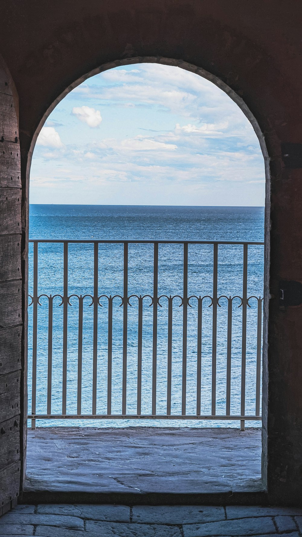 a view of the ocean through a window