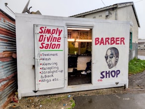 a white building with a sign on it
