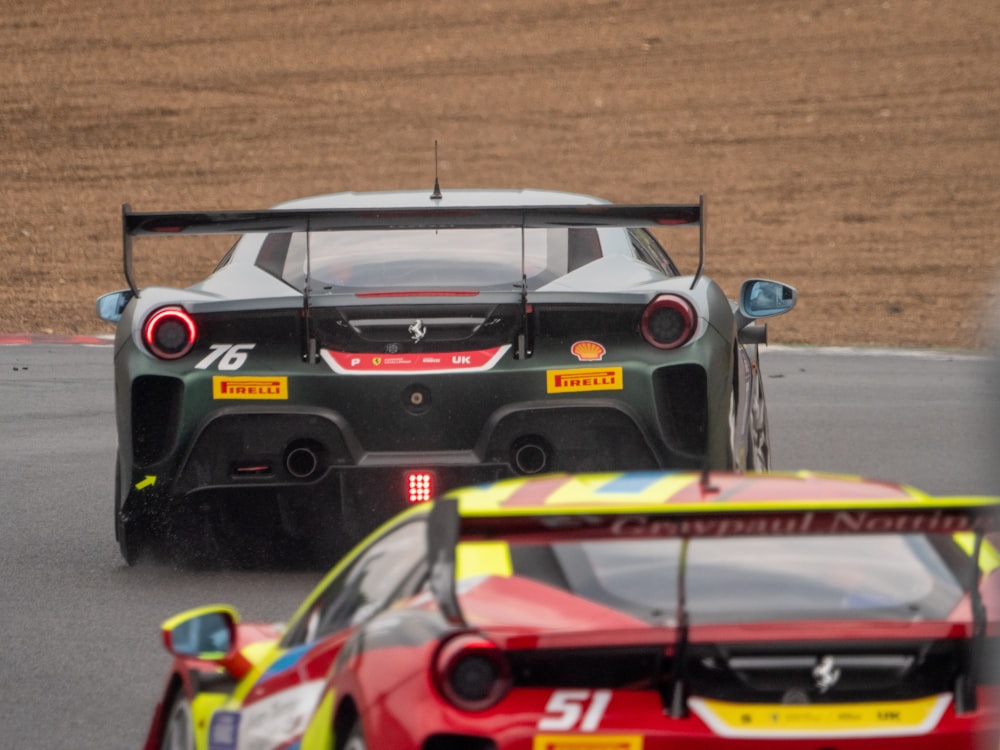 a group of race cars on a track