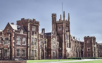 a large brick building with St James's Palace in the background