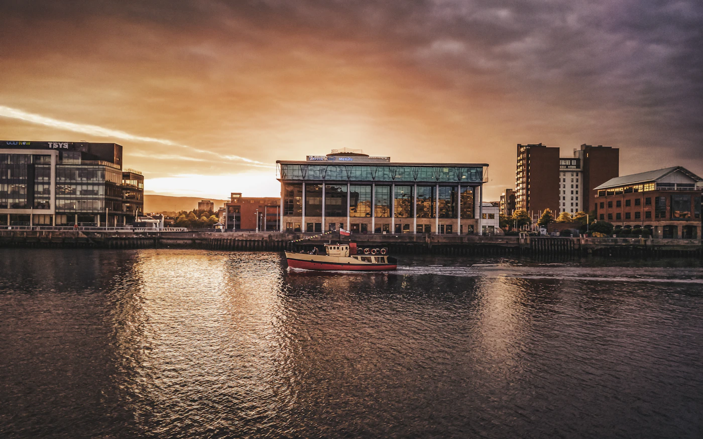 Belfast waterfront at sunset over the River Lagan