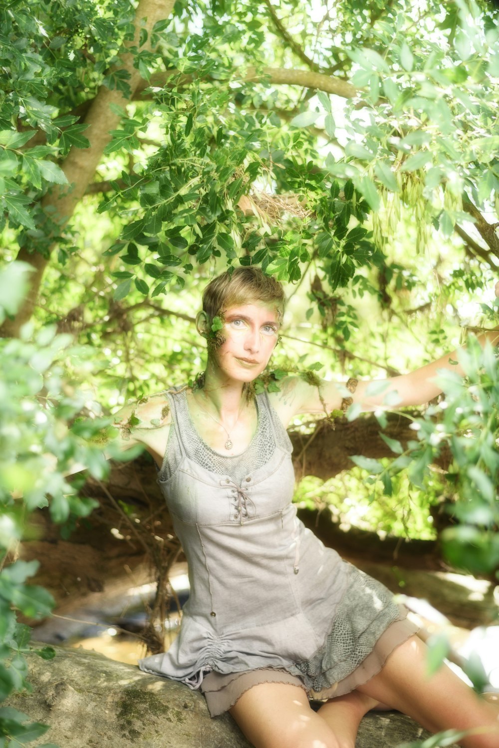 a person sitting on a rock