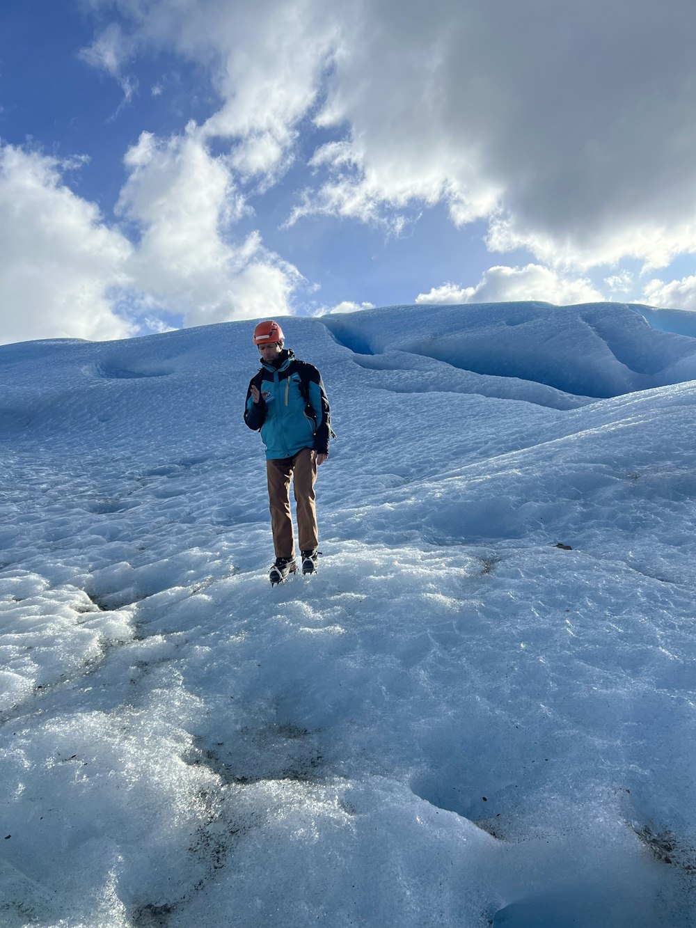 a man standing on a snowy mountain