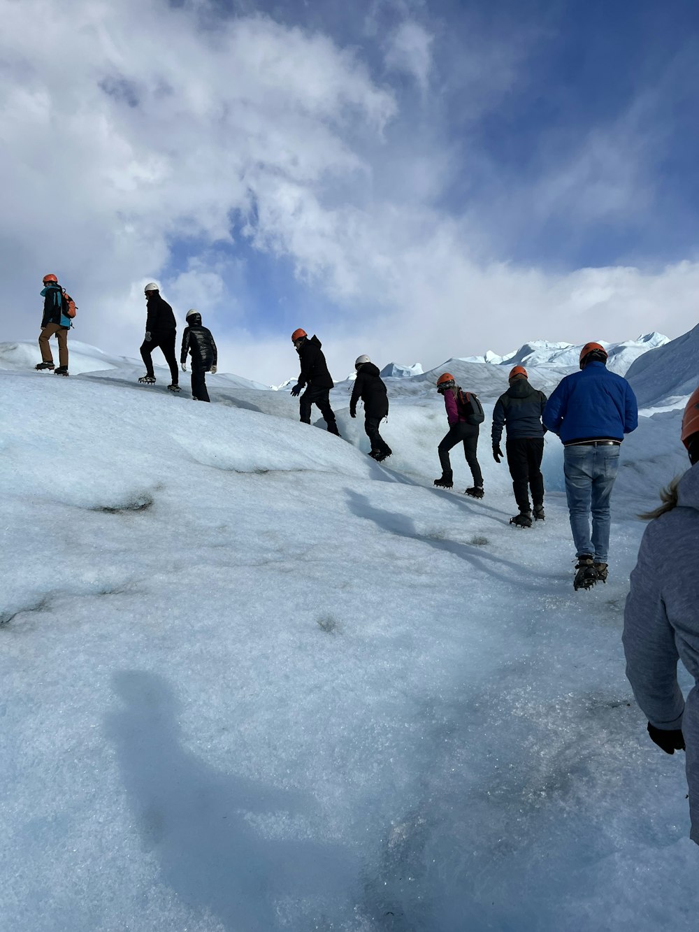 a group of people on a snowy mountain