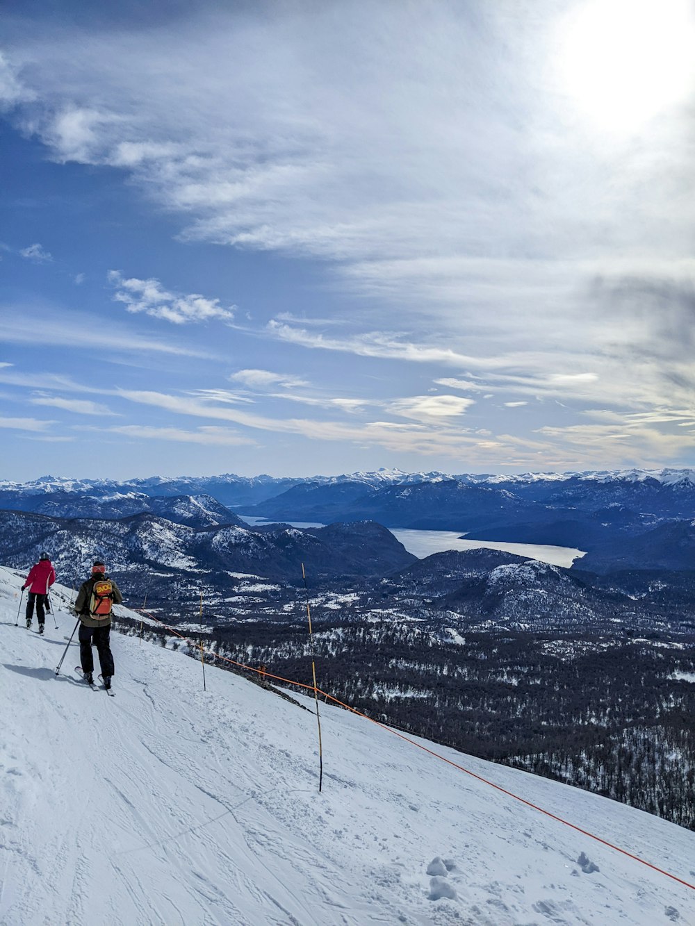 skiers on a snowy mountain