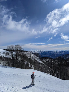 a person skiing on the snow