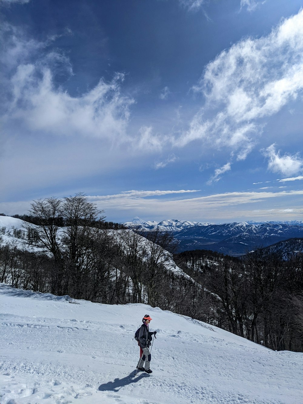 a person skiing on the snow