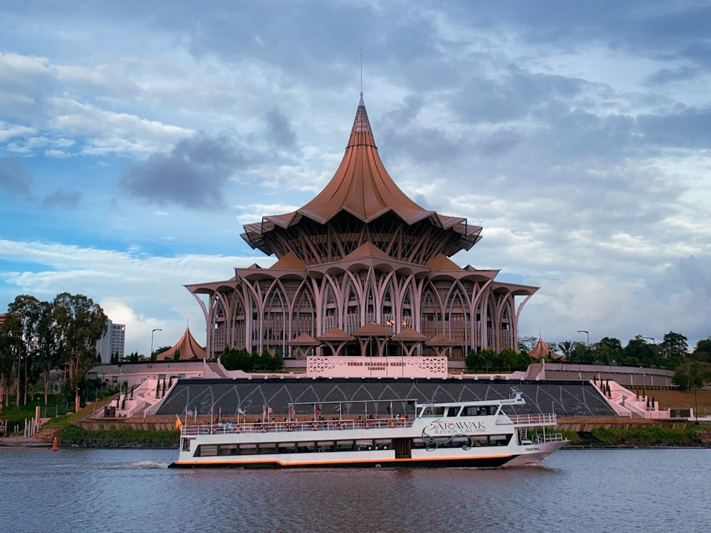 a boat in front of a building