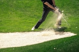 a man swinging a golf club