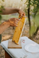 a person cutting wood