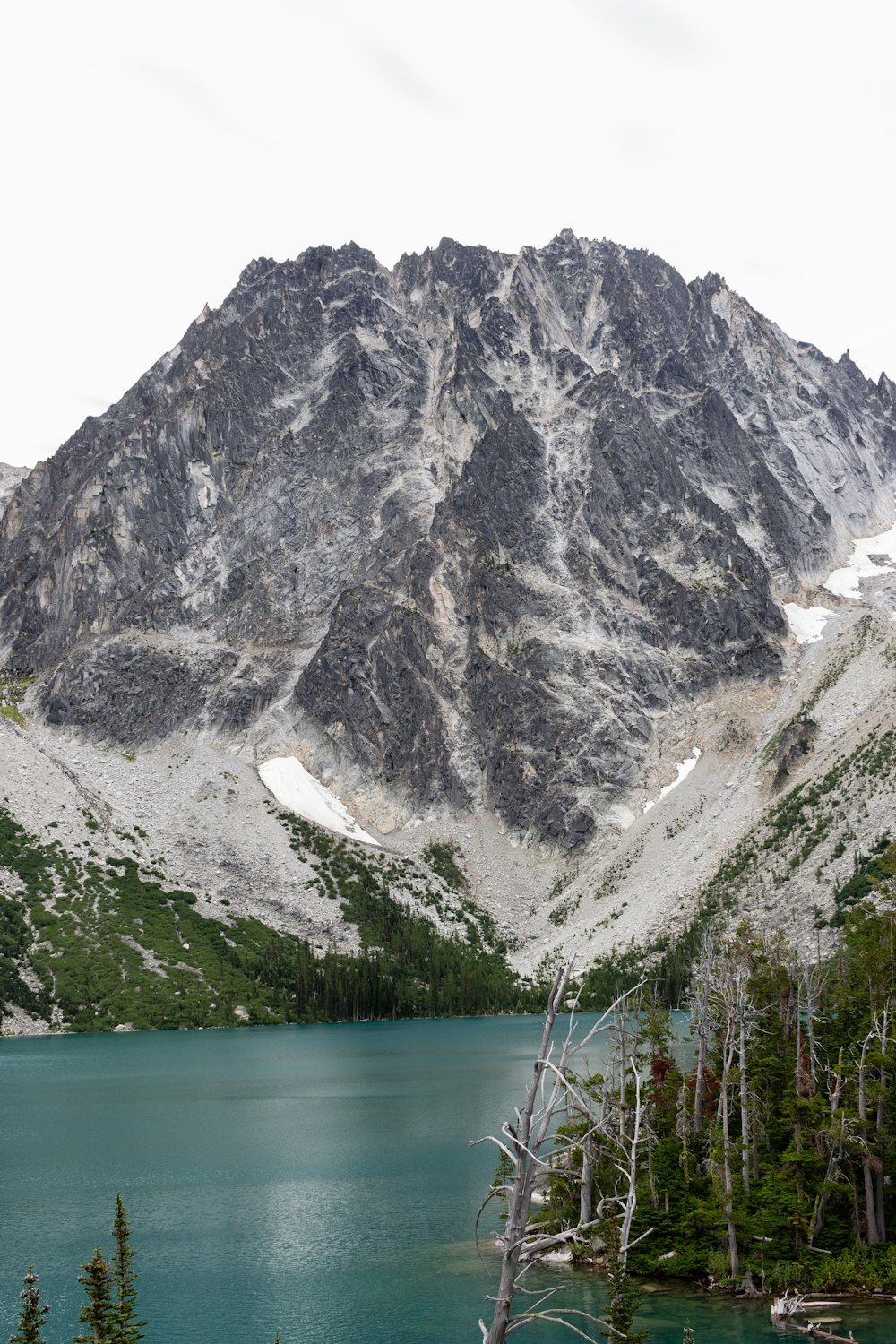 a lake with a mountain in the background