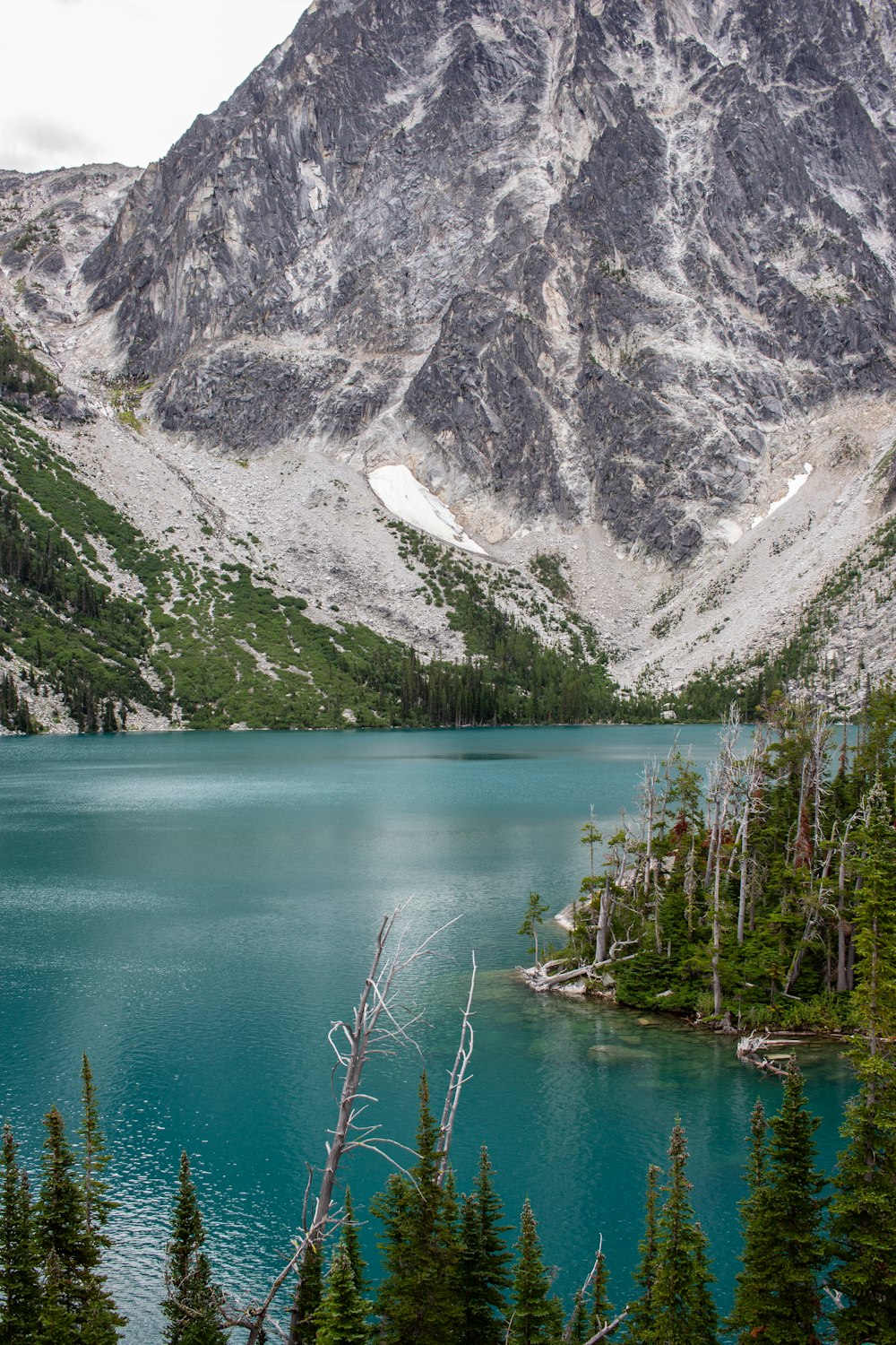 a lake surrounded by mountains