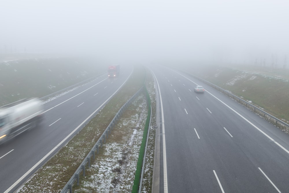 a highway with cars on it