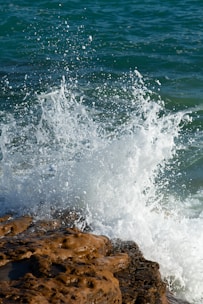 waves crashing on rocks