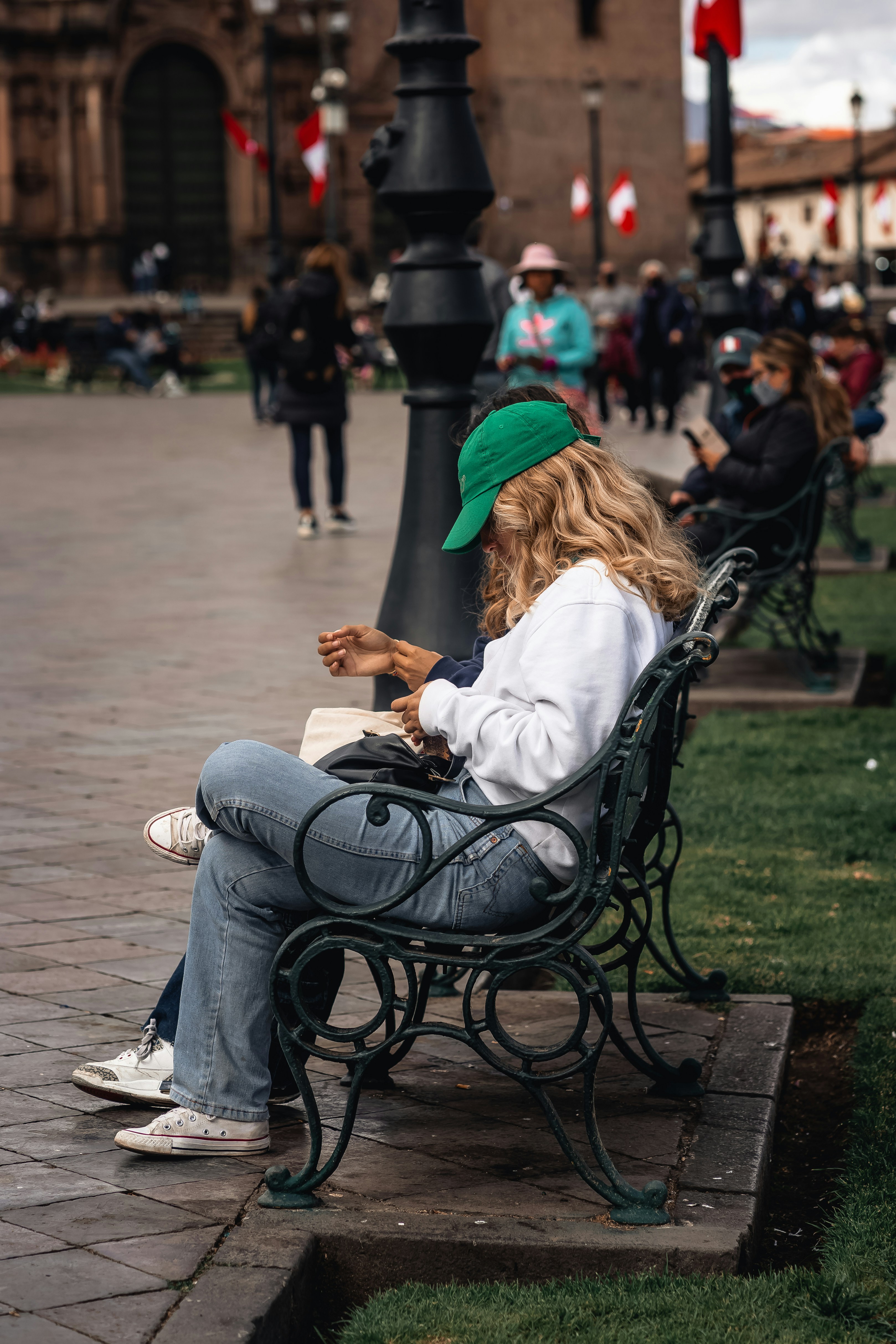 A reader on their phone enjoying Eleceed on a digital platform