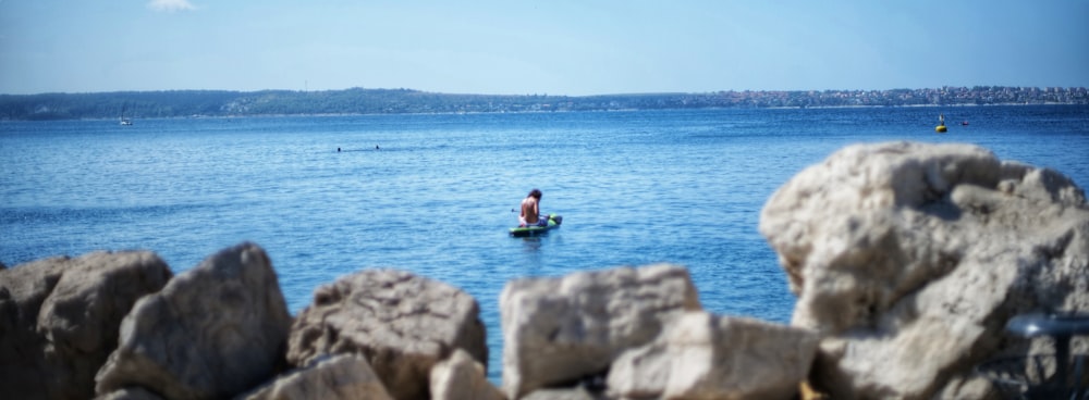 a person in a kayak in a body of water