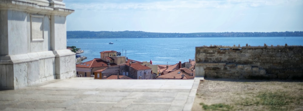 a group of buildings next to a body of water