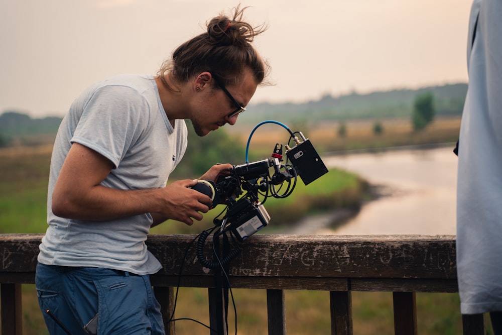 a person looking through a camera