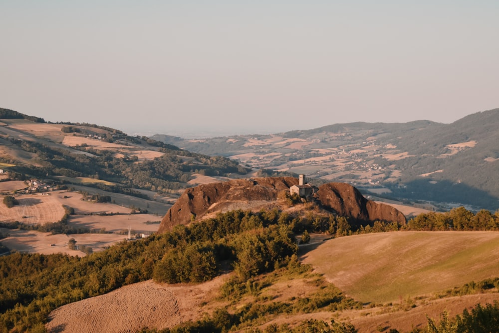 a landscape with hills and trees