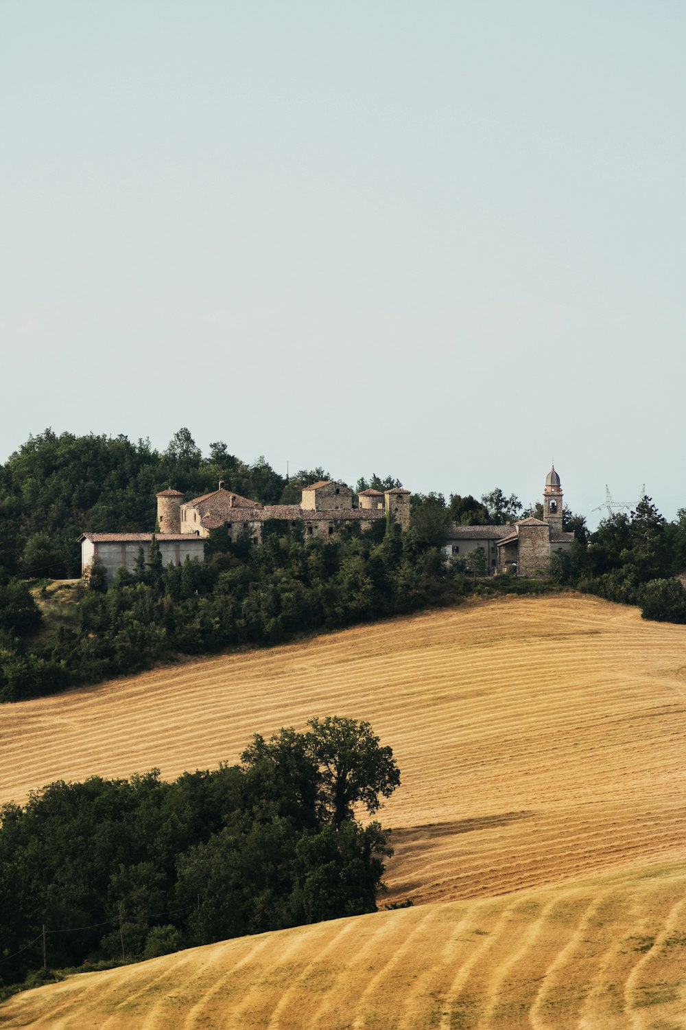 a large building on a hill