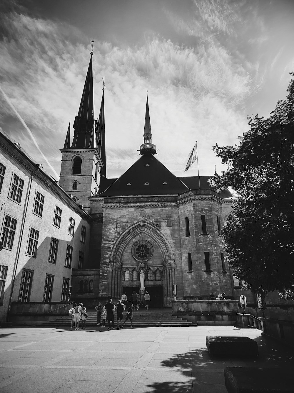 a group of people outside of a church