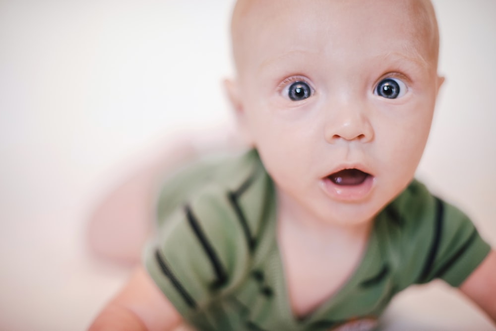 a baby with wide eyes