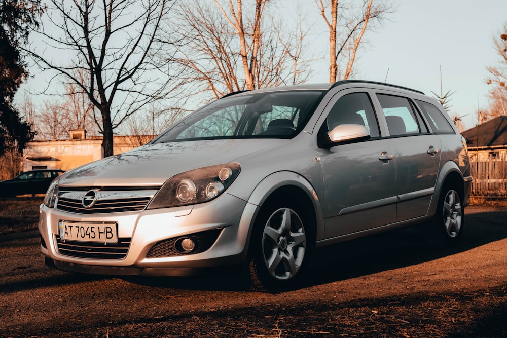 a car parked on a gravel road