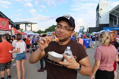 Happy customers enjoying their meals at a local event.